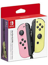 Joy-Con rose et jaune pastel