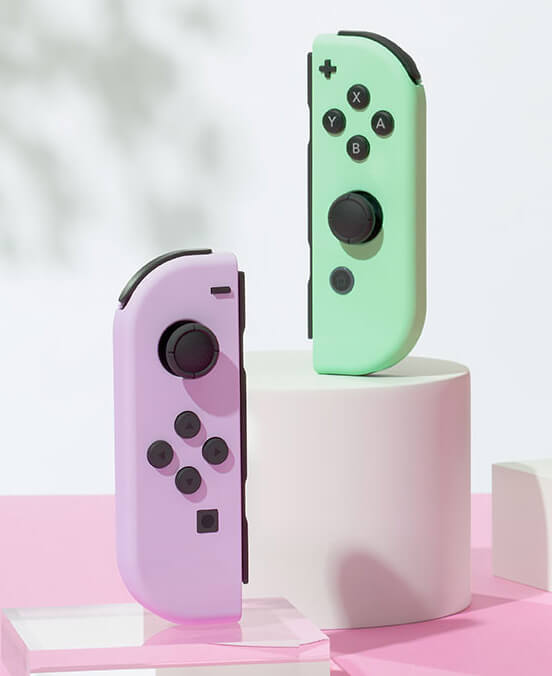 Joy Con violet et vert pastel